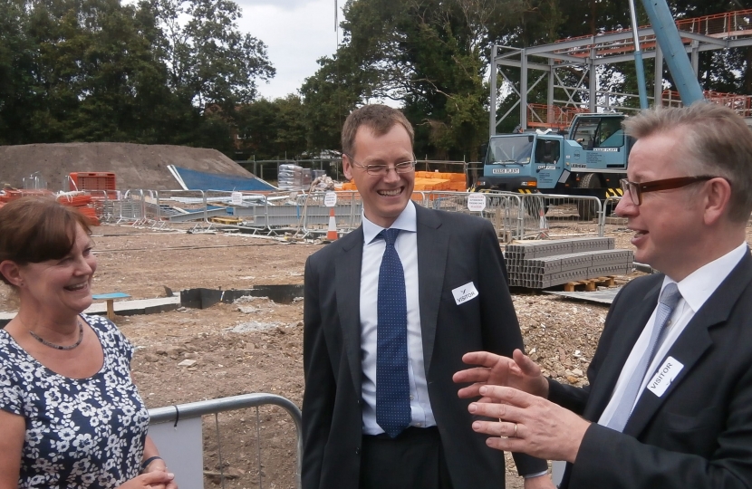 Michael Tomlinson and Michael Gove at Montacute School
